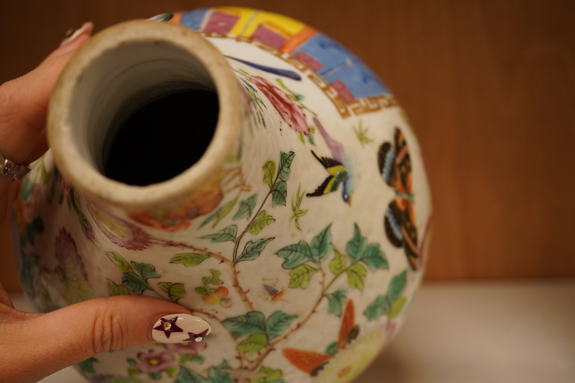 A 19th century Chinese famile rose vase, with an altered neck, 25cm high